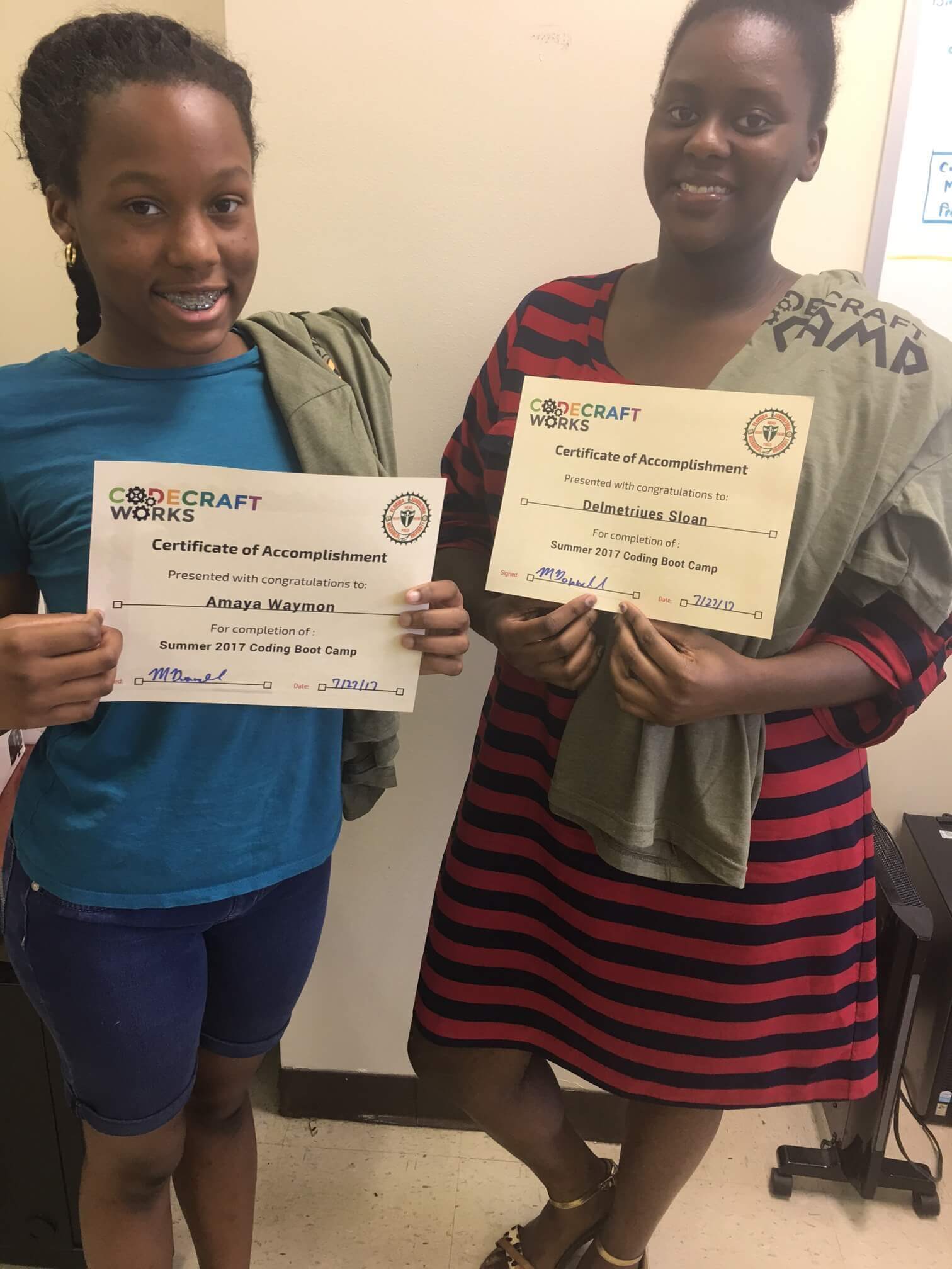 Photo of two Codecraft Works Certified middle school Students after a summer training in Tallahassee Florida